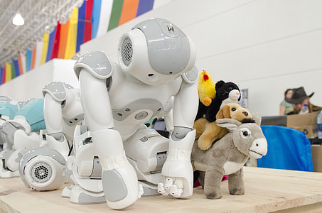 white and grey robot toys thumbnail