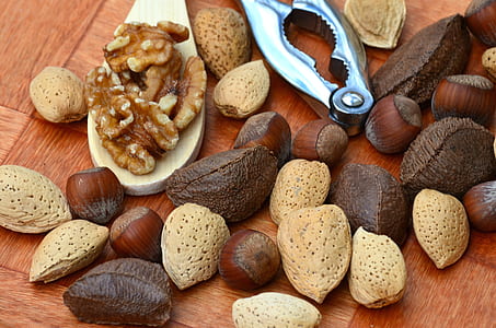 assorted nut lot with nut cracker thumbnail