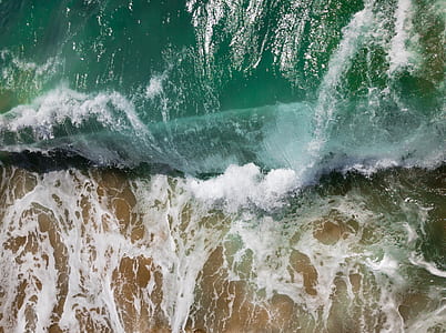 aerial photography of ocean waves thumbnail