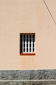 clear glass panel window on brown concrete wall thumbnail