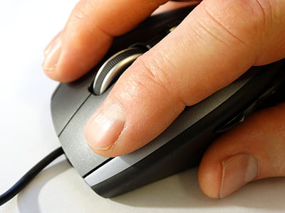 person using black corded mouse thumbnail