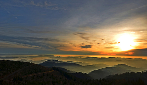 foggy mountains during sunset thumbnail