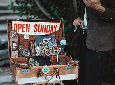 person standing beside storage chest thumbnail