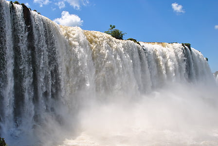 water falls during daytime thumbnail