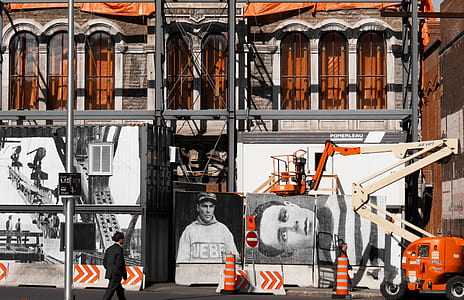 woman walking near at the building thumbnail