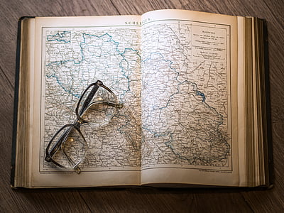 eyeglasses on book thumbnail