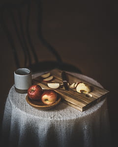 two apple on brown ceramic bowl thumbnail