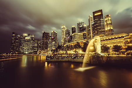 lion fountain and high rise buildings photo thumbnail