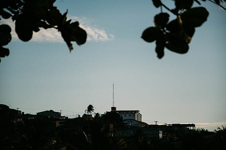white concrete structure on top of hill thumbnail