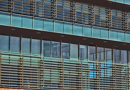 blue glass building during daytime thumbnail