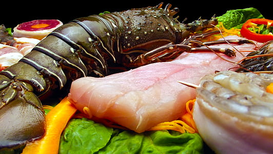 raw meat and lobsters thumbnail