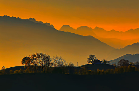 silhouette of house with view of mountain thumbnail