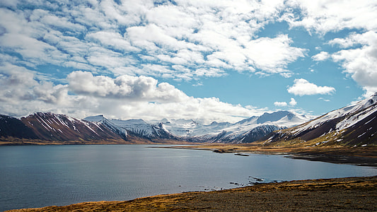 Majestic Mountains under the clouds in Iceland thumbnail