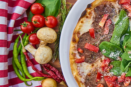 pepperoni pizza on brown wooden table thumbnail