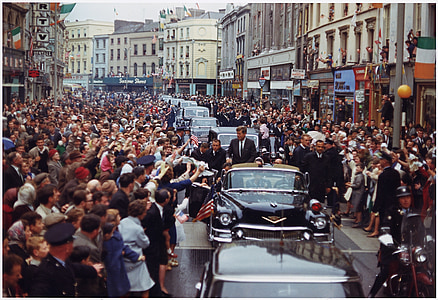 people watching John F Kennedy presidential parade during daytime thumbnail