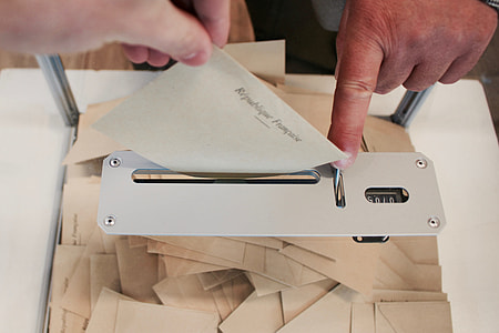 person cutting papers thumbnail