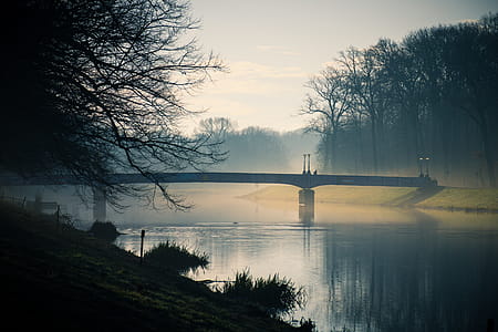 Gray Bridge Above River during Dusk thumbnail