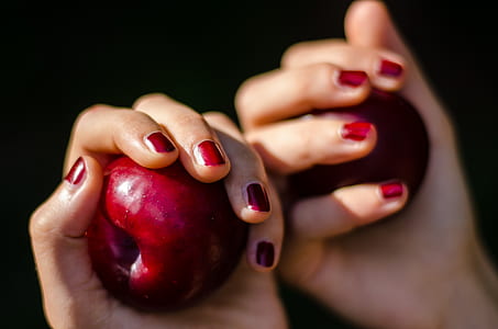 woman holding red apples thumbnail