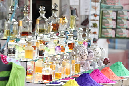 assorted decanters on glass rack thumbnail