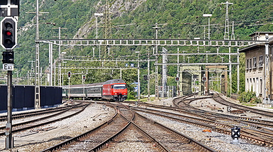 red train in railroad thumbnail