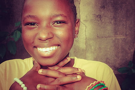 girl wearing scoop-neck shirt and colored bracelet thumbnail