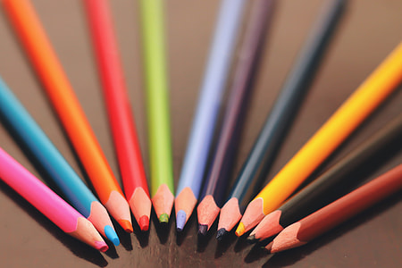 Coloured pencils on tabletop thumbnail