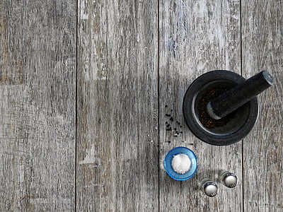 mortar and pestle near on condiment shakers thumbnail