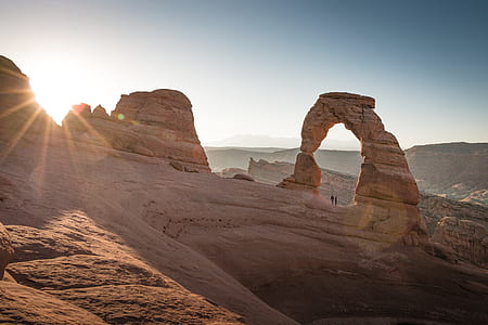 rock formations under clear blue sky during daytime thumbnail