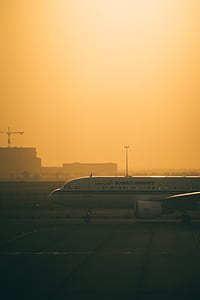 person showing white and blue Kuwait Airways airplane thumbnail