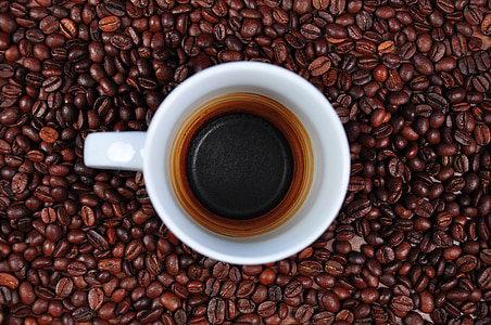 white ceramic mug with black coffee thumbnail
