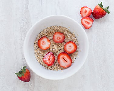 oatmeal with slice strawberries on bowl thumbnail
