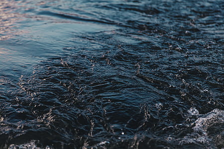 Close-up Photography of Body of Water thumbnail