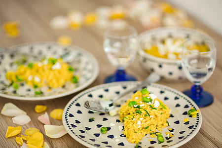 Risotto with broad bean on a cute plate with blue hearts thumbnail