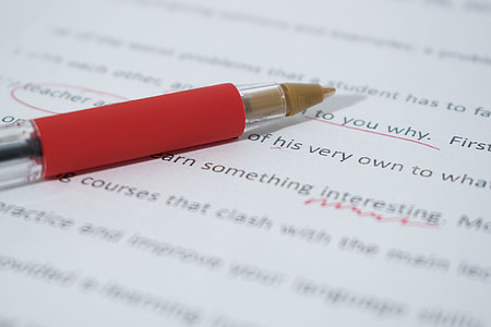 close up photo of red pen thumbnail