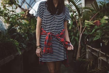 woman wearing black and white striped top thumbnail