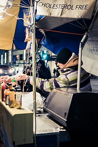 man wearing multicolored striped hoodie bubble jacket thumbnail