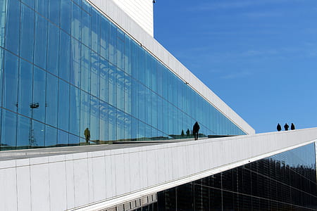 people walking near building during daytime thumbnail
