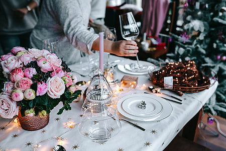 Hands Decorating Christmas Table thumbnail
