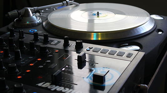 close-up photo of grey turntable thumbnail