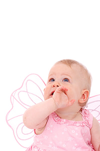 baby wearing butterfly wing eating hand photo thumbnail