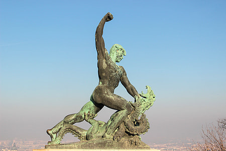 man statue near tree thumbnail