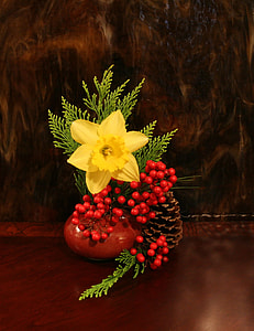 yellow Daffodil flowers in brown vase thumbnail