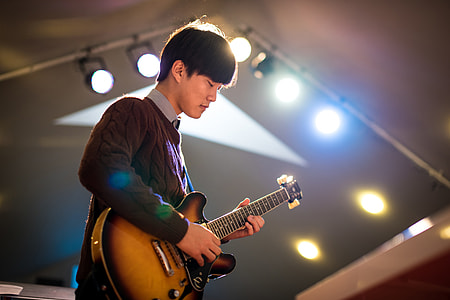 man playing guitar thumbnail