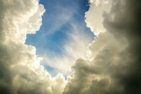 white clouds under clear blue sky thumbnail