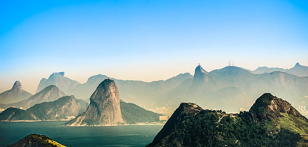 mountain on body of water thumbnail