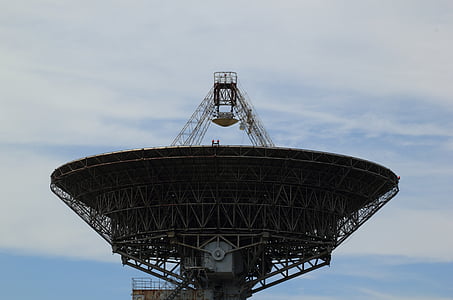 gray satellite pointing upward at daytime thumbnail