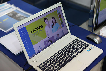 turned-on white Samsung laptop thumbnail