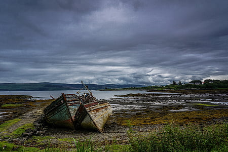photo of shipwreck docked on land thumbnail