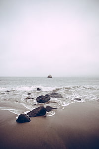 photo of rocks near beach thumbnail