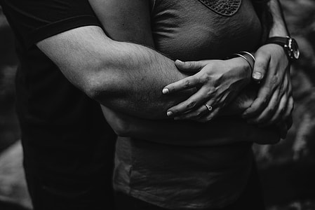 man embarrassing woman grayscale photo thumbnail